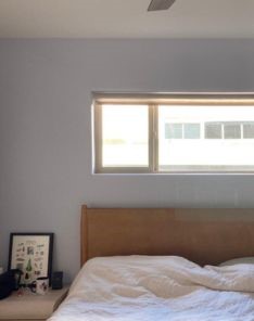 Cupertino bedroom window fitted with custom sheer pull down window shades, gently diffusing natural light for comfort and privacy.
