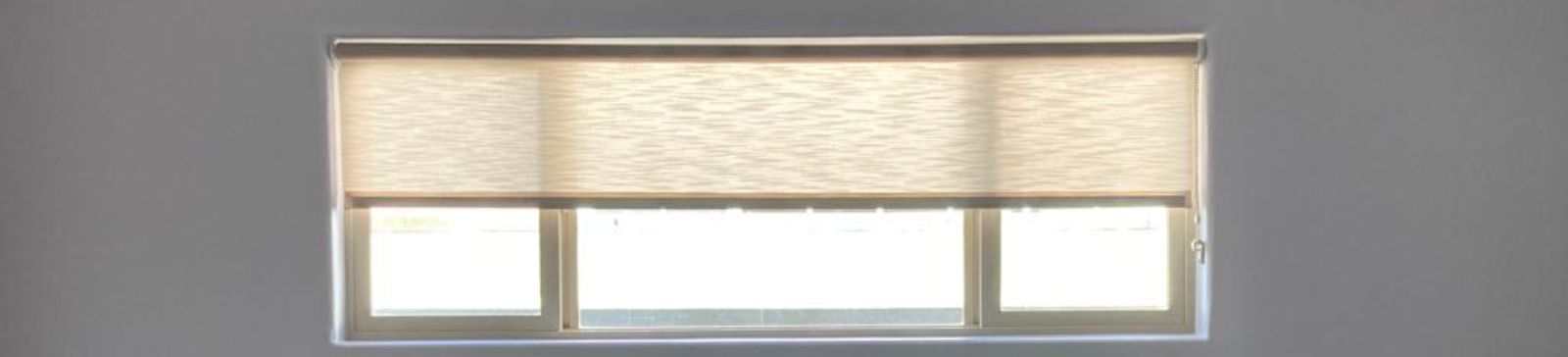 Close-up of modern sheer shades installed on a Cupertino bedroom window, highlighting the elegant fabric and smooth pull down mechanism.